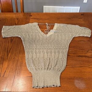 Women’s Studio Y light sweater with a tie in the back size medium